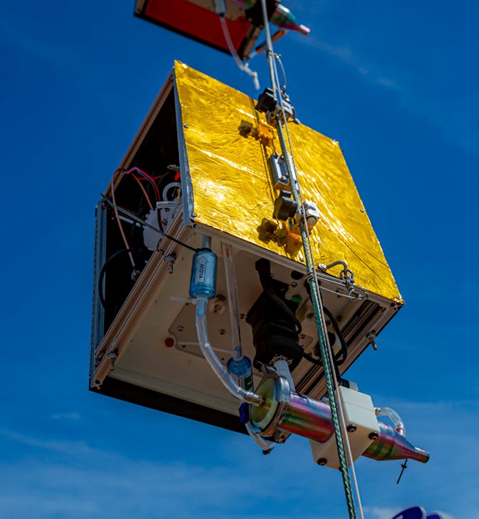 In June 2024, Jen’s prototype reactive condensation particle counter is winched aloft on a tethered balloon at SGP. 